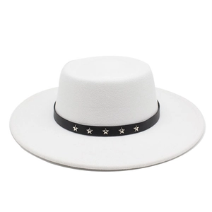 White flat-top boater wool hat with black star-studded band and wide brim for women