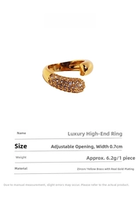 Detail of adjustable gold-plated brass ring with zircon inlay and product dimensions