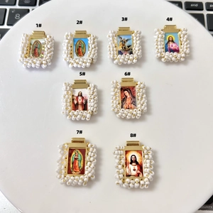 Eight gold religious pendants with white beads and saint portraits for DIY jewelry