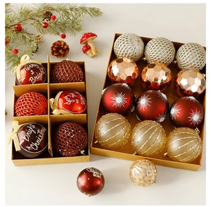 Detail of Christmas ornament set with glitter and matte finishes in a gift box