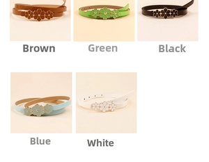 Close-up of thin fashion belts showing floral buckles in brown green black blue white