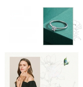 Detail of S925 sterling silver ring with star zircon stone and elegant model showcase