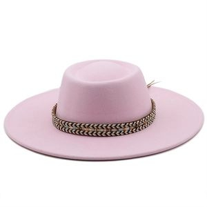 Pink flat top wool felt hat with ethnic woven band and wide brim detail view