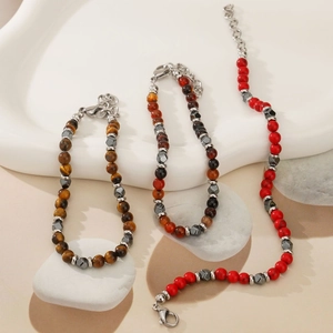 Men's bohemian beaded bracelet set featuring tiger eye, red stone and metal beads
