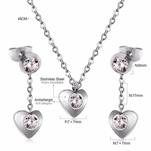 Detail showing dimensions of heart jewelry set with chain length and material info