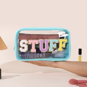 Blue waterproof PVC makeup bag with colorful glitter STUFF letter patches for travel storage