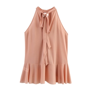 Detail of pink halter neck top with ruffled hem and lightweight chiffon fabric