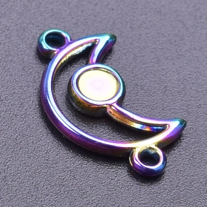 Macro view of rainbow stainless steel crescent moon pendant with circular inlay setting
