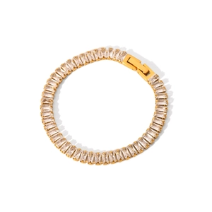 Detail of a gold-plated tennis bracelet with square-cut baguette cubic zirconia stones