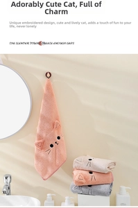 Detailed view of high-density coral fleece towel with cute 3D cat ears and embroidery