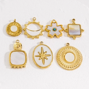 14K gold plated stainless steel pendants with white shell inlay and celestial motifs