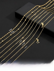 Detail of S925 sterling silver gold plated necklaces including snake and box chain styles