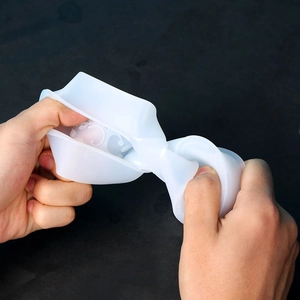 Macro view of flexible translucent silicone mold showing high elasticity and durability