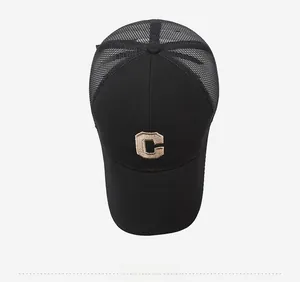 Top down view of black mesh baseball cap with khaki letter C embroidery on cotton fabric