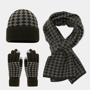 Detail of knit set showing olive green diamond patterns and touchscreen glove fingertips