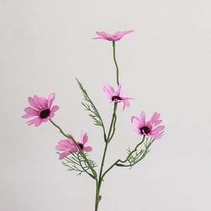 Detailed close-up of a pink artificial daisy flower with green stem against white background