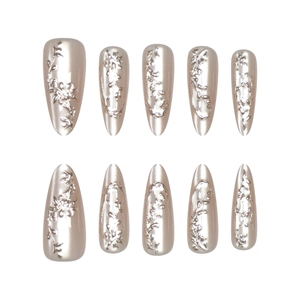 3D floral embossed champagne gold press-on nails with long pointed mirror metallic finish