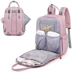Pink multi-functional diaper backpack showing interior compartments with baby essentials