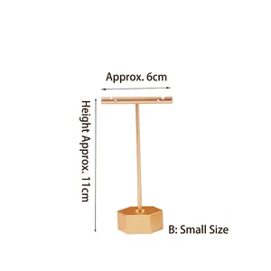 Golden T-shaped metal earring stand with hexagonal base, small size measuring 6cm by 11cm