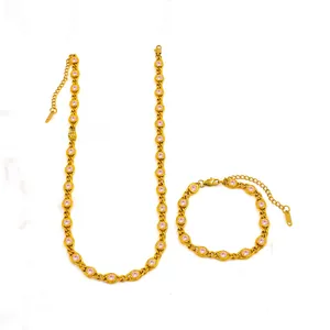 Detail of 18K gold plated jewelry set featuring 7mm pink zircon necklace and bracelet