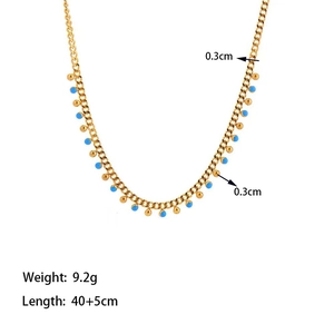 Gold-plated stainless steel flat chain necklace with vibrant sky blue stone beads