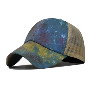 Detail of colorful graffiti canvas front and breathable mesh back of the baseball cap