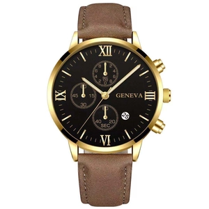 Detail of gold alloy watch case with brown leather strap and black Roman numeral dial