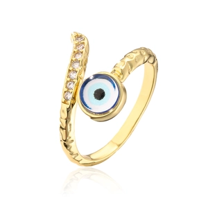 Detail of 18K gold plated evil eye ring with blue zircons and sparkling white stones