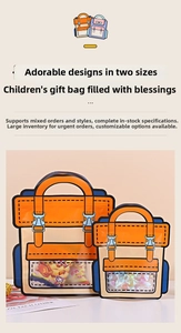Detail of schoolbag-shaped candy bags in two sizes with transparent windows for snacks