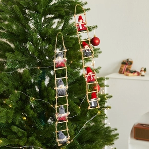Christmas hanging decor featuring Santa dolls climbing a wooden ladder on a festive tree