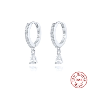 Macro detail of S925 sterling silver hoop earrings with clear teardrop zircon pendant