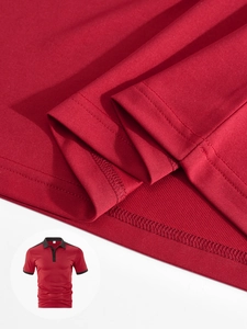 Macro detail of breathable pique fabric texture and stitching on a red polo shirt