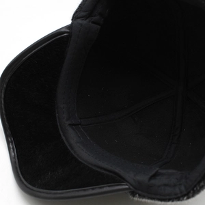 Detailed view of the warm fleece lining and reinforced stitching inside the winter hat
