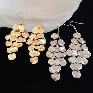 Multi-layer sequin drop earrings in gold and silver metal finishes with ear hooks