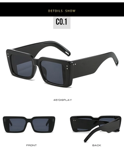 Detailansicht der quadratischen Sonnenbrille mit breiten Bügeln und Silbernieten