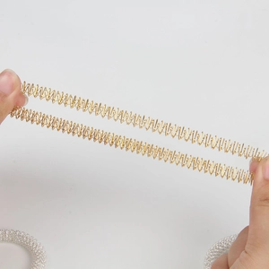 Flexible metal spring acupressure massage rings in gold and silver for stress relief
