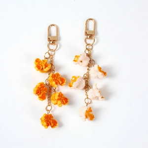 Realistic PVC popcorn keychain charms with caramel and original flavors for bags