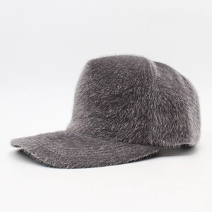 Women's grey faux fur baseball cap with plush winter texture for stylish warmth outdoors