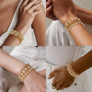 Layered pearl and gold bead bracelet set for women, elegant minimalist fashion jewelry.