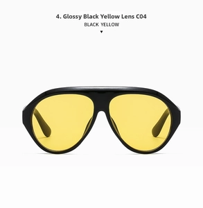 Détail de lunettes aviateur noires surdimensionnées avec verres jaunes, modèle C04