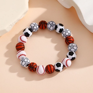 Close-up of woven adjustable sports bracelet featuring basketball, football, and baseball beads