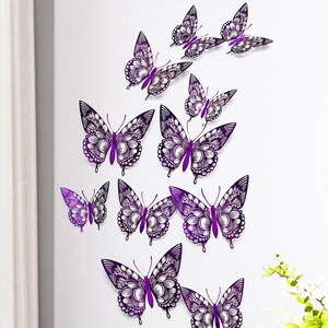 Detailed view of 3D purple hollow butterfly wall stickers with intricate cutouts on wall