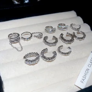 Sparkling 11-piece silver ear cuff set with zirconia hearts and cross flower designs