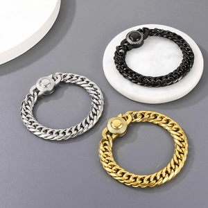 Detailed view of silver, black and gold 11mm Cuban chain bracelets with iced-out CNC clasps