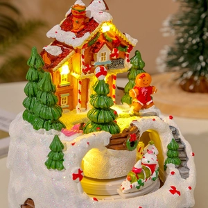 Macro view of glowing Christmas candy shop with moving sled and festive LED light decor
