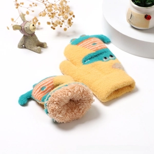 Detail of warm winter toddler mittens featuring striped knit and thick faux fleece lining