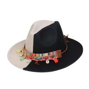 Detail of two-tone wool fedora with bohemian band featuring shells and colorful tassels