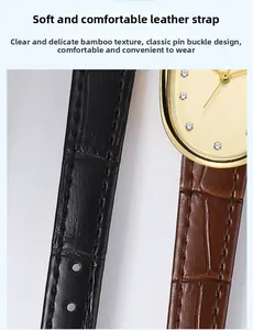 Detailed view of bamboo grain leather watch straps in black and brown with gold buckle