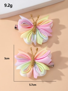 Detail of handmade fabric butterfly clip with size 5.7x5cm and weight 9.2g specifications