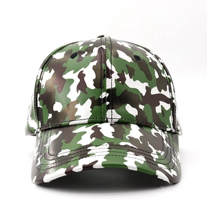 Detail of green camouflage faux leather baseball cap with six-panel design and curved brim